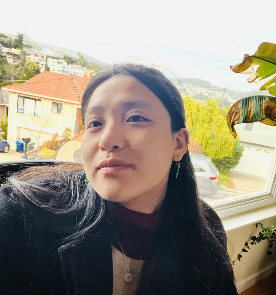 Portrait of Julia by a window